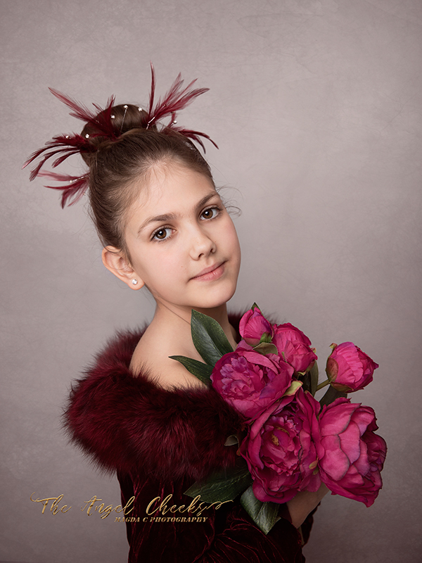 fine art portrait girl in purple dress and flowers