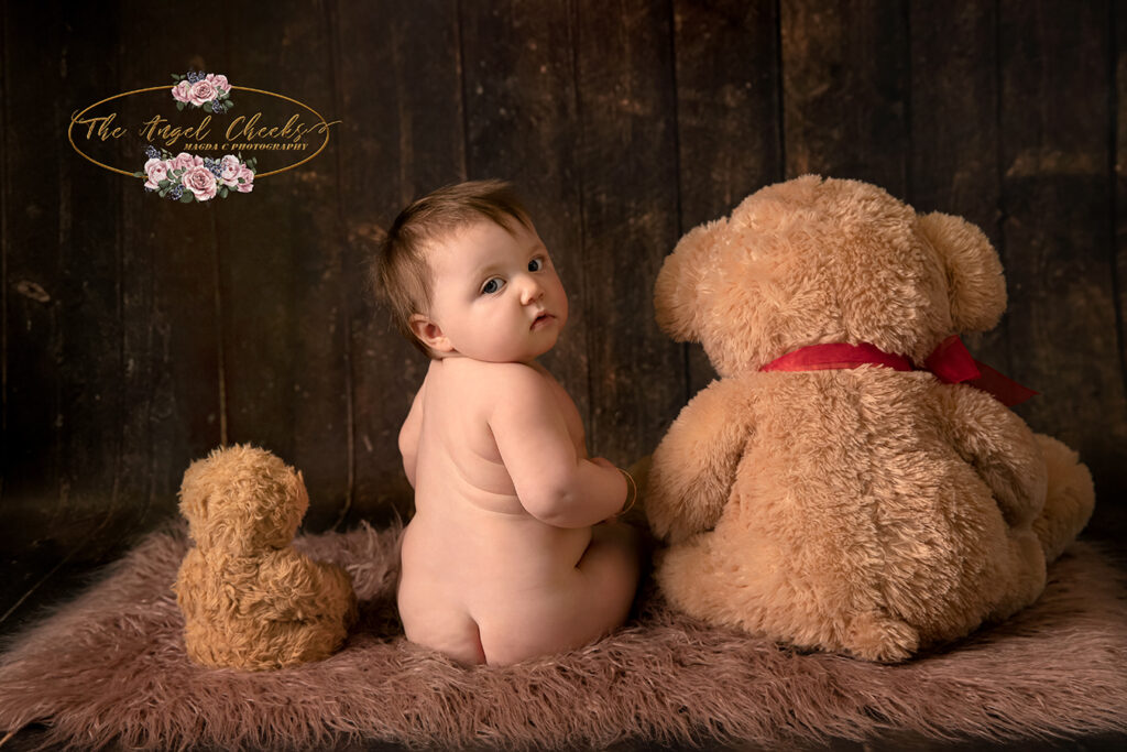 baby with teddies