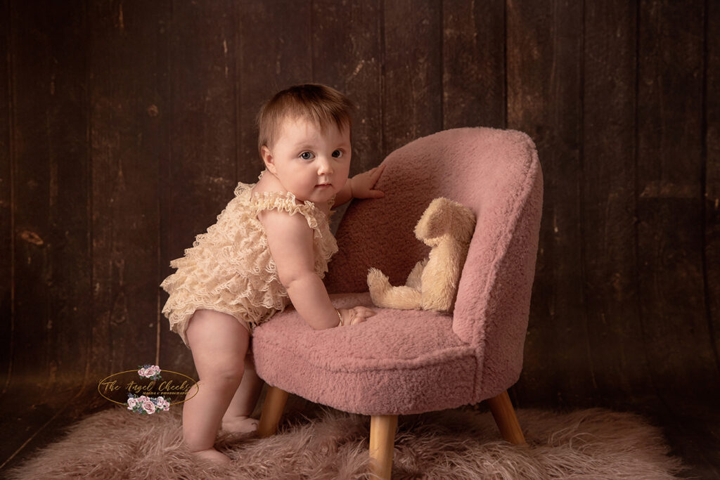 baby standing with chair