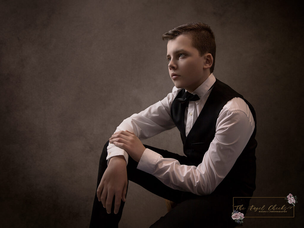portrait of a young boy sitting
