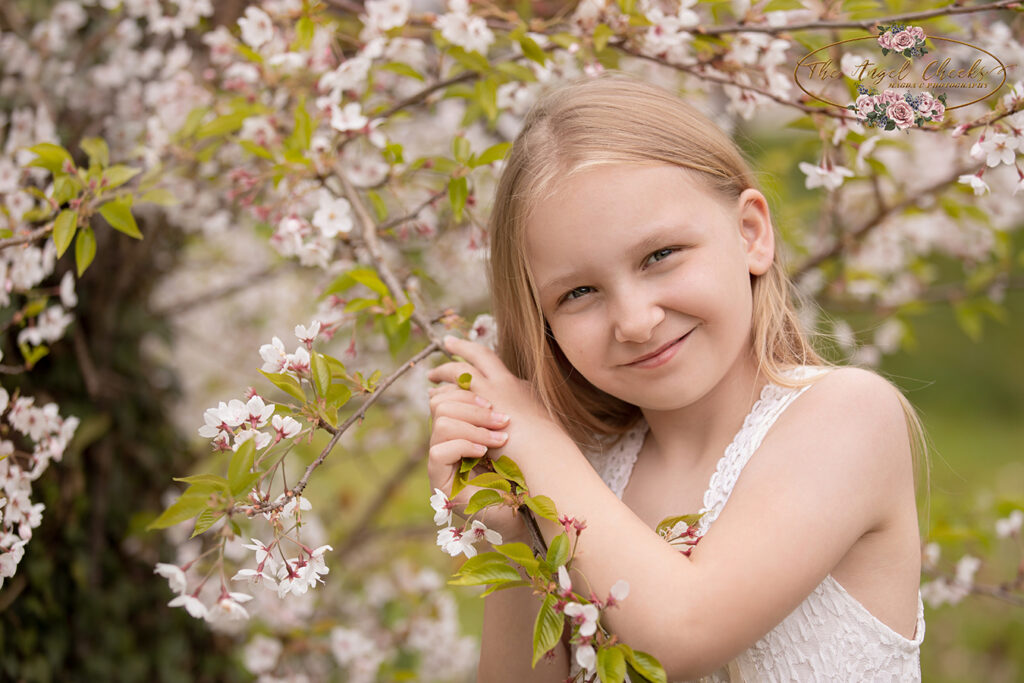 springblossom white flakes child portrait photography