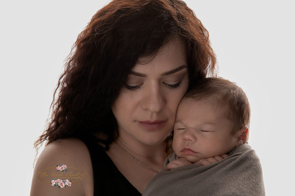 parent and nnewborn photography session