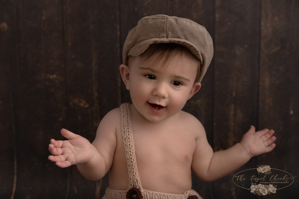 siting baby in a hat
